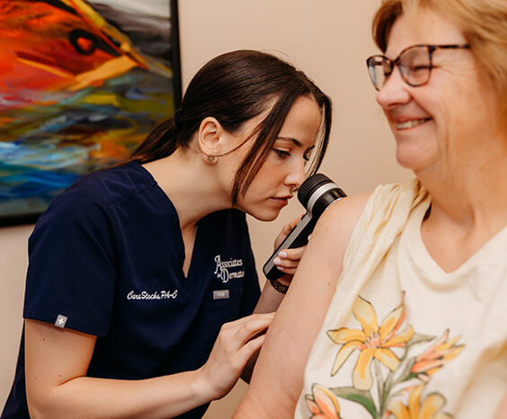 Medical Dermatology.  Cara Stocks, PA reviewing skin