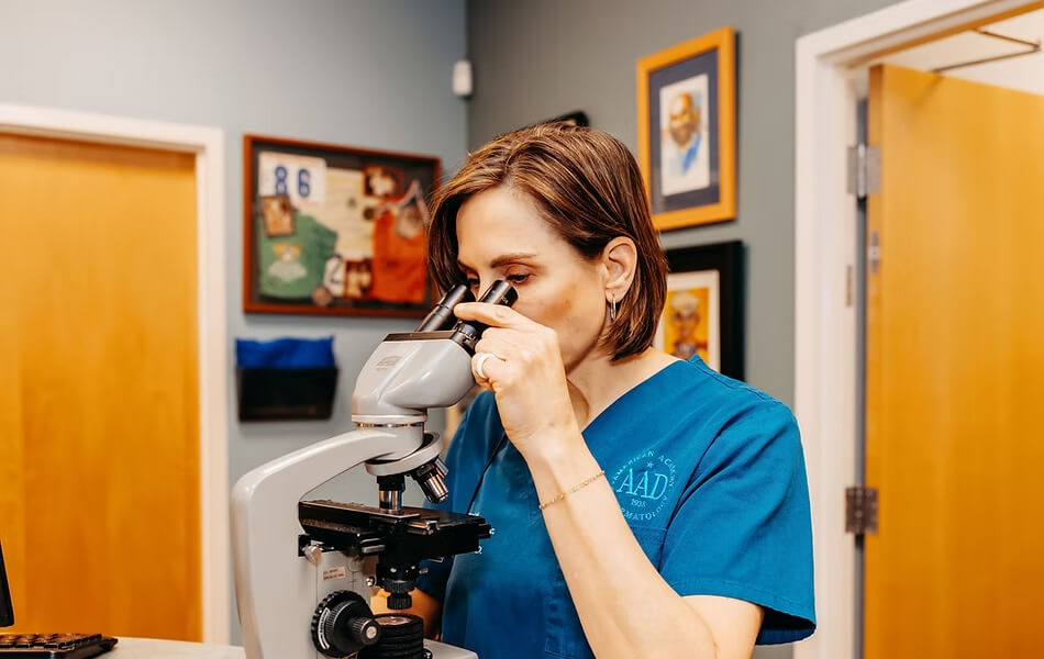 Skin Cancer Basics showing Dr. Coker and microscope